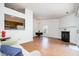 Bright living room showcasing hardwood floors, fireplace, and natural light at 2213 Alpine Rd, Durham, NC 27707