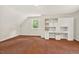 Bonus room with ample storage space and natural light from a single window at 224 Fleming Dr, Durham, NC 27712