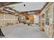 Unfinished garage with shelving features overhead lighting, a side entrance, and is ready for customization at 224 Fleming Dr, Durham, NC 27712