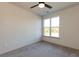 Bedroom with a ceiling fan and carpeted floors at 2321 Gathering Sq Ct, Fuquay Varina, NC 27526