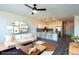 A virtually staged room with a view into the kitchen at 2321 Gathering Sq Ct, Fuquay Varina, NC 27526