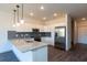 Stylish kitchen with stainless steel appliances, granite countertops, and white cabinetry at 2323 Gathering Sq Ct, Fuquay Varina, NC 27526