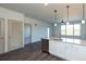 Bright kitchen with granite countertops, stainless steel appliances, and access to living area at 2323 Gathering Sq Ct, Fuquay Varina, NC 27526