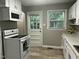 Well-equipped kitchen with stainless steel appliances, ample cabinet space, and convenient access to the backyard at 2331 Kennington Rd, Raleigh, NC 27610