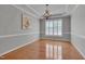 Elegant dining room with hardwood floors, a chandelier, and crown molding at 2420 Rogerson St, Raleigh, NC 27614