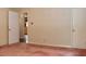 Bedroom featuring pink carpet, decorative wallpaper and doorway to other rooms in the home at 2440 Gardner Holt Rd, Burlington, NC 27215
