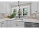 White kitchen with window above sink at 2704 Farnborough Rd, Raleigh, NC 27613