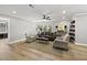 Spacious living room with recessed lighting, modern fixtures and a comfortable seating arrangement at 2704 Farnborough Rd, Raleigh, NC 27613