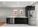 Bright kitchen with stainless steel appliances and large windows at 2803 Atlantic St, Durham, NC 27707