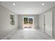Bright living room with sliding doors leading to the deck at 2803 Atlantic St, Durham, NC 27707