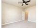 This bedroom features neutral paint colors and a ceiling fan at 2808 Carter Finley Pl, Raleigh, NC 27606