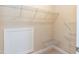 Walk-in closet with wire shelving system and neutral paint at 2808 Carter Finley Pl, Raleigh, NC 27606
