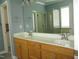 Bathroom with a double sink vanity and a separate shower, creating a functional and elegant space at 3008 River Hill Ln, Burlington, NC 27217