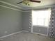 Bright bedroom featuring neutral carpeting, paint, and decor offering a peaceful retreat at 3008 River Hill Ln, Burlington, NC 27217