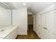 Bathroom with white vanity, doorway to another room, and a large mirror at 3112 Lake Pointe Trl, Rocky Mount, NC 27804