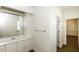 Bathroom with ample vanity space, large mirror, and classic fixtures, providing a functional and stylish space at 3112 Lake Pointe Trl, Rocky Mount, NC 27804