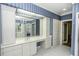 Bathroom featuring vanity, drawers and a large mirror at 3112 Lake Pointe Trl, Rocky Mount, NC 27804
