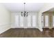 Dining room with hardwood floors and views of other rooms at 3112 Lake Pointe Trl, Rocky Mount, NC 27804