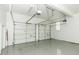 Spacious garage with two car capacity, bright lighting, and white walls at 3112 Lake Pointe Trl, Rocky Mount, NC 27804