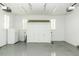 Large garage featuring a storage closet, ample lighting, and space for multiple vehicles at 3112 Lake Pointe Trl, Rocky Mount, NC 27804