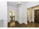 Hallway entrance featuring hardwood floors and bright white trim at 3112 Lake Pointe Trl, Rocky Mount, NC 27804