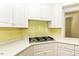 Modern kitchen with a gas cooktop, white countertops, and custom cabinetry at 3112 Lake Pointe Trl, Rocky Mount, NC 27804