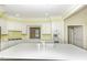 Bright kitchen featuring white cabinets, countertops, and a view into another room at 3112 Lake Pointe Trl, Rocky Mount, NC 27804