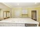Bright eat-in kitchen with a central island and white cabinetry at 3112 Lake Pointe Trl, Rocky Mount, NC 27804