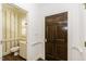 Powder room with custom wallpaper and hardwood flooring at 3112 Lake Pointe Trl, Rocky Mount, NC 27804