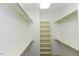 Walk-in closet featuring built-in shelves and ample storage space at 3112 Lake Pointe Trl, Rocky Mount, NC 27804