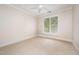 Bedroom features a ceiling fan and carpeted floors at 3701 Baron Cooper Pass # 303, Raleigh, NC 27612