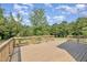 An elevated wood deck offers ample space for outdoor enjoyment at 407 Kadir Womble Dr, New Hill, NC 27562