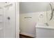 Bathroom features a modern vanity, round mirror, and tiled shower at 407 Kadir Womble Dr, New Hill, NC 27562