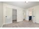 Bedroom with modern color scheme with walk-in closet and access to bathroom at 407 Kadir Womble Dr, New Hill, NC 27562