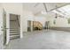Spacious garage features two sets of stairs and lots of storage at 407 Kadir Womble Dr, New Hill, NC 27562