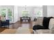 Bright living room featuring hardwood floors, neutral colors, stylish furnishings, and an open concept layout at 4111 Branchwood Dr, Durham, NC 27705