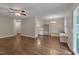 Charming dining area with hardwood floors, built-in bench, and modern chandelier at 4140 Willow Haven Ct, Raleigh, NC 27616