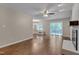 Open living area featuring a fireplace, hardwood floors, and ample natural light at 4140 Willow Haven Ct, Raleigh, NC 27616