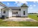 Exterior of the home featuring a yard and concrete patio at 419 Mabry Rd, Angier, NC 27501