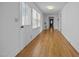 Inviting hallway entrance boasting hardwood floors, white trim, and natural light at 419 Mabry Rd, Angier, NC 27501