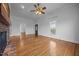 Bright living room with hardwood floors and adjacent rooms viewed through archways at 419 Mabry Rd, Angier, NC 27501