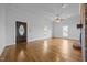 Bright living room with hardwood floors and fireplace at 419 Mabry Rd, Angier, NC 27501