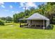 Outbuilding on a large rural property with a pond and lawn at 419 Mabry Rd, Angier, NC 27501