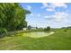 Scenic pond with lush greenery in the background, offering a tranquil outdoor setting at 419 Mabry Rd, Angier, NC 27501