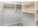 Walk-in closet with custom shelving, multiple rods, and great organization potential at 4403 Sunburst Ct, Raleigh, NC 27613