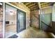 Covered patio offering access to an indoor living space through a sliding door at 4403 Sunburst Ct, Raleigh, NC 27613