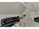 Bonus room with vaulted ceilings, carpeted floors, and access to a seating area and office at 500 Chandler Grant Dr, Cary, NC 27519