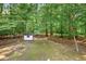 The backyard shows a shed and greenery at 508 Bolin Creek Dr, Carrboro, NC 27510
