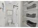 Bathroom featuring toilet, shower, and shelving storage at 508 Bolin Creek Dr, Carrboro, NC 27510