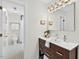 Clean bathroom featuring black and white tile, a vanity sink, and modern fixtures at 508 Bolin Creek Dr, Carrboro, NC 27510